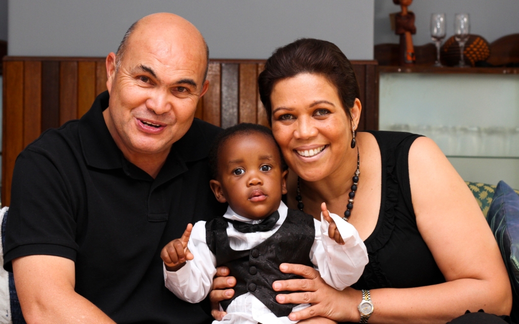 Yvette and husband, Dean, with Tsepi, my son.
